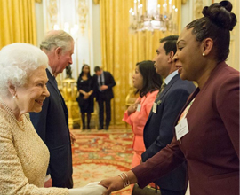 the queen shaking hands